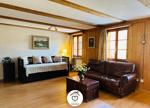 Bed, Living room, Seating area, Bedroom