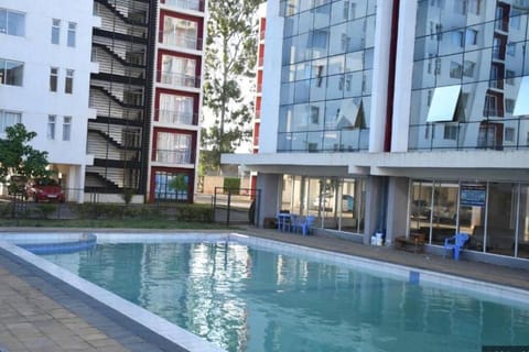 Property building, Day, Pool view, Swimming pool