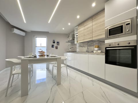 Kitchen or kitchenette, Dining area, dishwasher, oven, stove, toaster