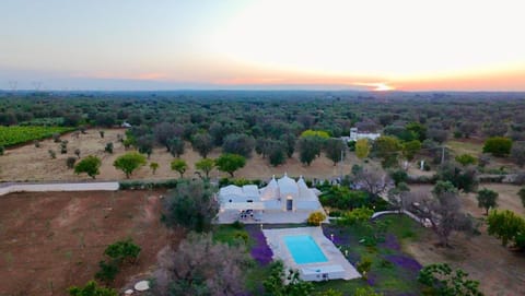 Property building, Natural landscape, Bird's eye view, Pool view, Sunset