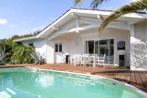 Property building, Living room, Swimming pool