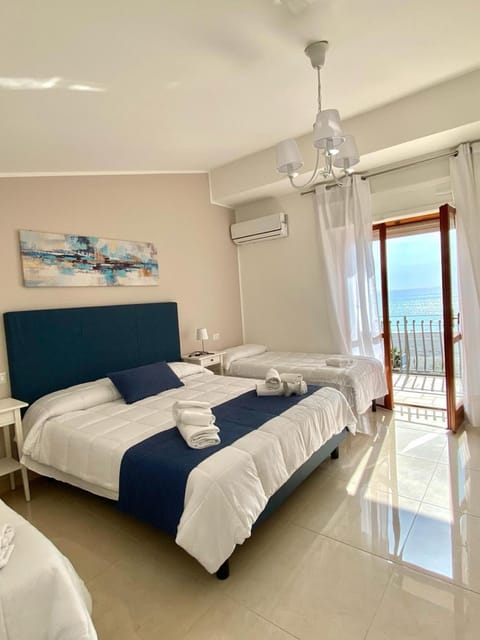 Bed, Photo of the whole room, Bedroom, towels, air conditioner