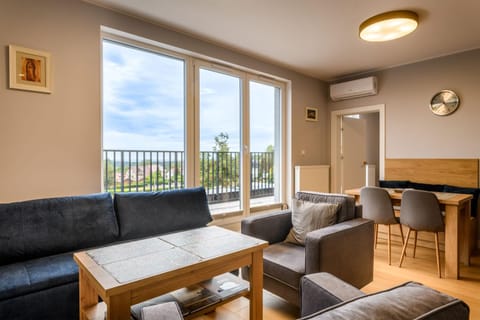 View (from property/room), Balcony/Terrace, Living room, Seating area, Dining area, air conditioner