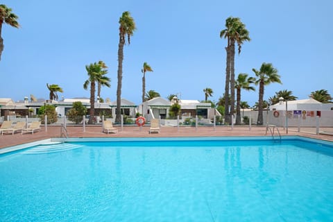 Property building, Living room, Swimming pool