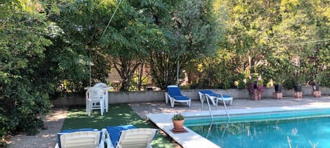 Property building, Living room, Swimming pool