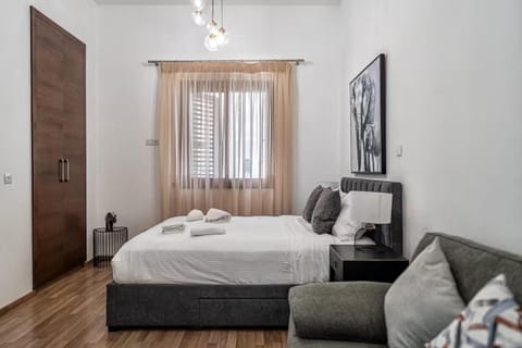Bed, Living room, Decorative detail, towels, wardrobe