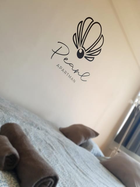 Bed, Property logo or sign