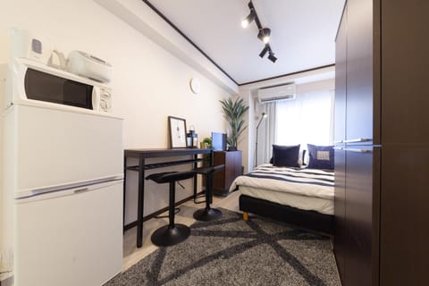 Bed, TV and multimedia, Seating area, Bedroom, minibar, wardrobe