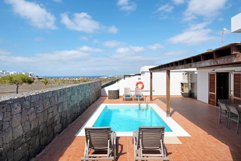 Property building, Living room, Swimming pool