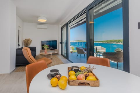 View (from property/room), Balcony/Terrace, Living room, Seating area, Sea view