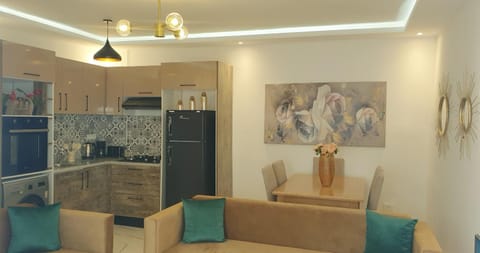 Kitchen or kitchenette, Living room, Seating area, Dining area