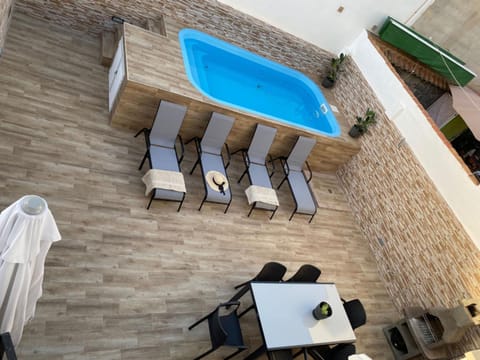 Swimming pool, sunbed