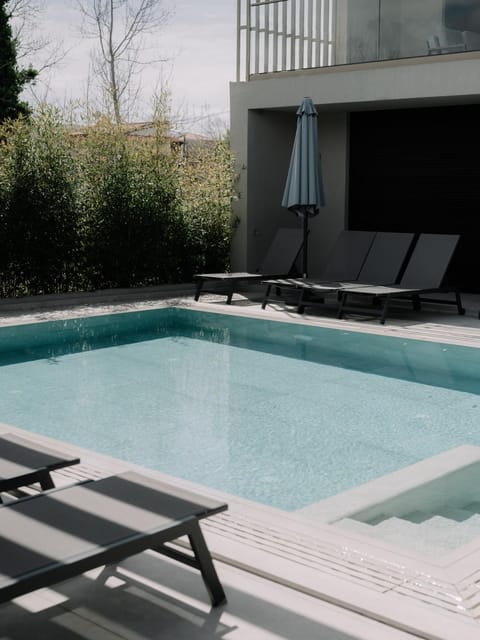 Swimming pool, sunbed