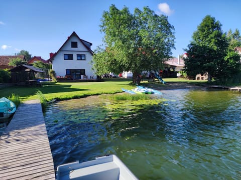 Property building, Day, Natural landscape, Garden, Lake view
