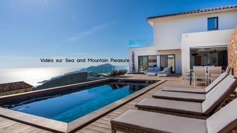Property building, Patio, Natural landscape, View (from property/room), Balcony/Terrace, Living room, Seating area, Pool view, Sea view, Swimming pool, sunbed