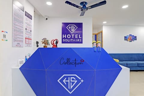 Property logo or sign, Lobby or reception, fireplace
