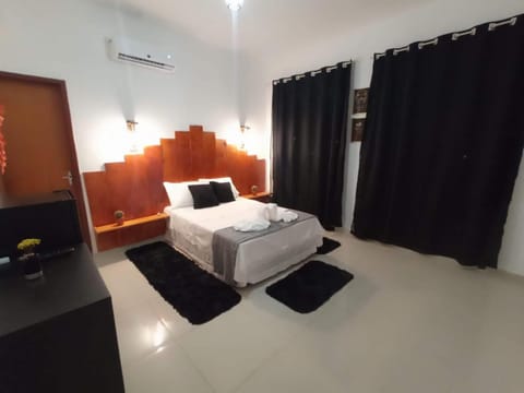 Bed, Photo of the whole room, Bedroom, towels, air conditioner