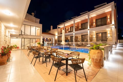 Property building, Patio, Night, View (from property/room), Balcony/Terrace, Pool view, Swimming pool, sunbed