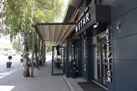 Property building, Patio, Facade/entrance, Day, Property logo or sign