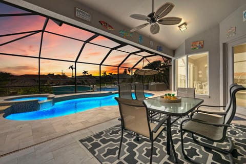 Patio, Hot Tub, Seating area, Swimming pool, Sunset