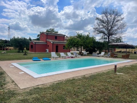 Property building, Day, Pool view, Swimming pool, sunbed