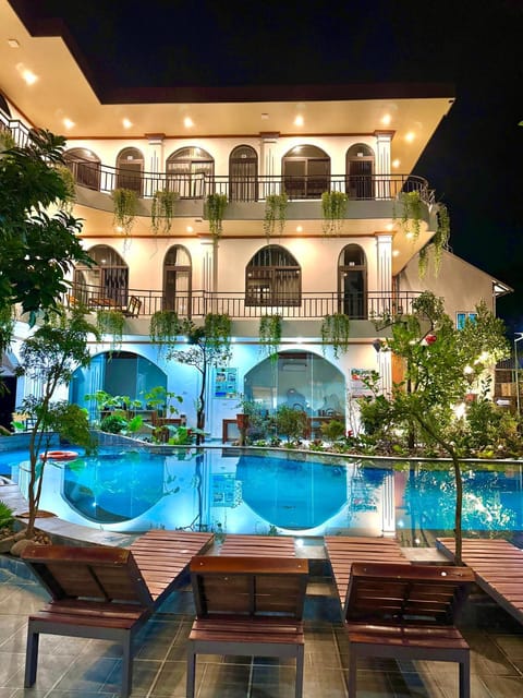 Property building, Patio, Night, Swimming pool