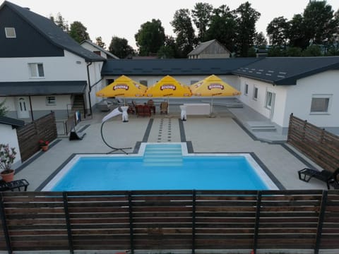 Property building, Pool view, Swimming pool, sunbed