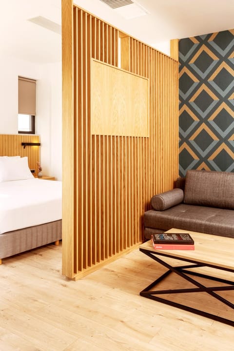 Bed, Living room, Seating area, Bedroom