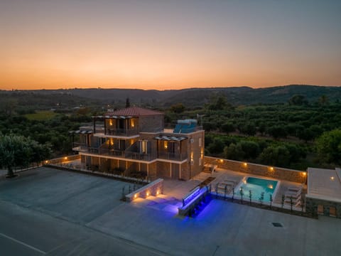 Property building, Natural landscape, Bird's eye view, Pool view, Swimming pool, Sunset