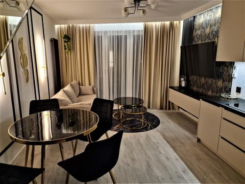 TV and multimedia, Kitchen or kitchenette, Living room, Seating area, Dining area, fireplace, minibar