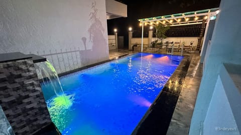 Patio, Night, Seating area, Pool view, Street view, Swimming pool, Quiet street view