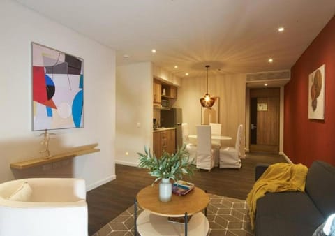 Living room, Dining area, microwave, stove, kitchen