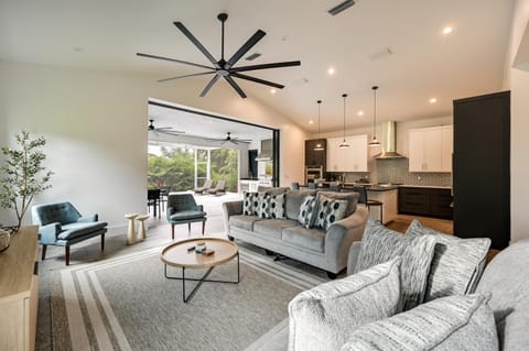 Contemporary Naples Home with Outdoor Kitchen and Pool House in East Naples