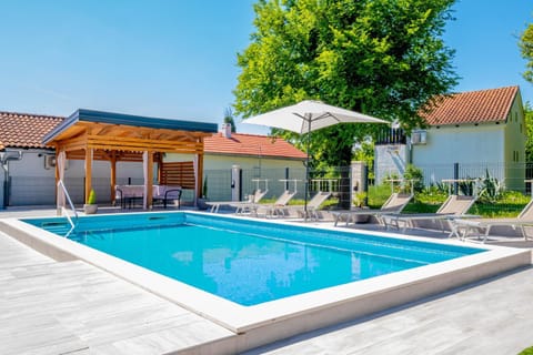 Patio, Day, Natural landscape, Summer, Pool view, Swimming pool, sunbed