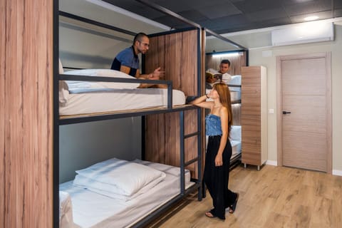 Bed, Photo of the whole room, Bedroom, group of guests, bunk bed, wardrobe, air conditioner