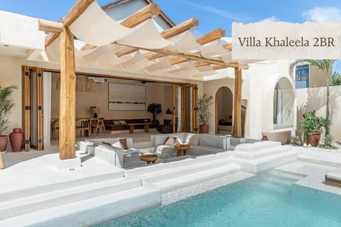 Property building, Seating area, Pool view, Swimming pool, sunbed