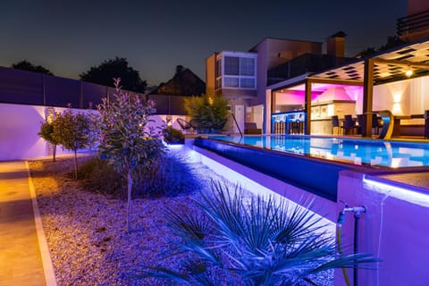 Property building, Night, Pool view, Swimming pool