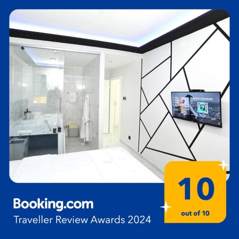 Bed, Hot Tub, Massage, Massage, TV and multimedia, Spa and wellness centre/facilities, Spa and wellness centre/facilities, Other, Photo of the whole room, Decorative detail, Bedroom, Text overlay, Guests, Certificate/Award, Certificate/Award, towels, VIP