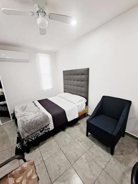 Bed, Living room, Photo of the whole room, Seating area, Bedroom, fireplace
