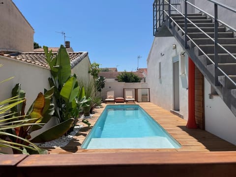Property building, Pool view, Swimming pool, sunbed