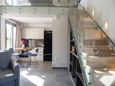 Kitchen or kitchenette, Living room, Seating area, Dining area