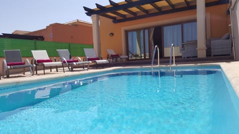 Patio, Pool view, sunbed