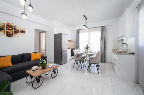 Kitchen or kitchenette, Living room, Seating area, Dining area