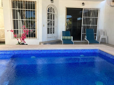 Patio, Pool view, Swimming pool, sunbed