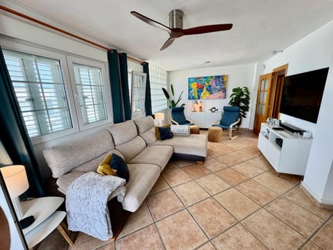 TV and multimedia, Living room, Seating area, fireplace, air conditioner