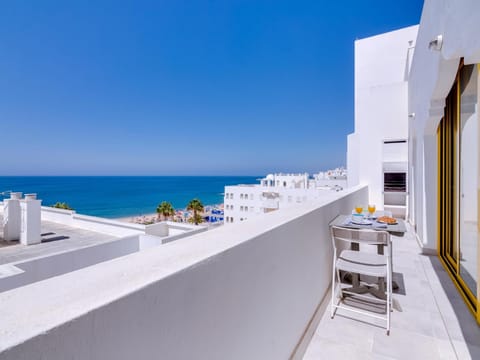 Property building, Patio, Day, Natural landscape, View (from property/room), Balcony/Terrace, Balcony/Terrace, Dining area, Beach, Sea view