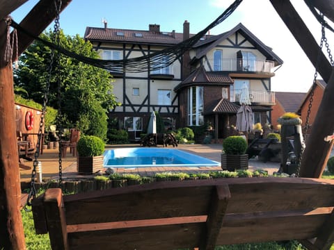 Property building, Patio, Garden, Garden view, Pool view, Swimming pool, sunbed