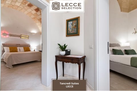 Bed, Property logo or sign, Photo of the whole room, Logo/Certificate/Sign, Bedroom, Text overlay, Certificate/Award, fireplace, air conditioner