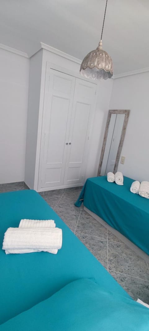 Acogedor apartamento en Daimús a 150 metros de la playa con parking privado y piscinas comunitarias Apartment in Daimús