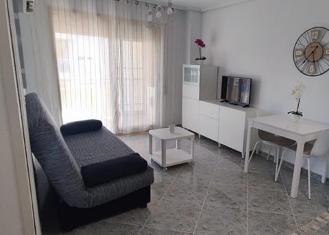 Acogedor apartamento en Daimús a 150 metros de la playa con parking privado y piscinas comunitarias Apartment in Daimús